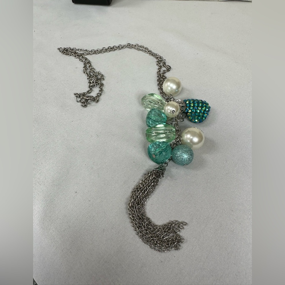 Long charm style heart theme silvertone necklace